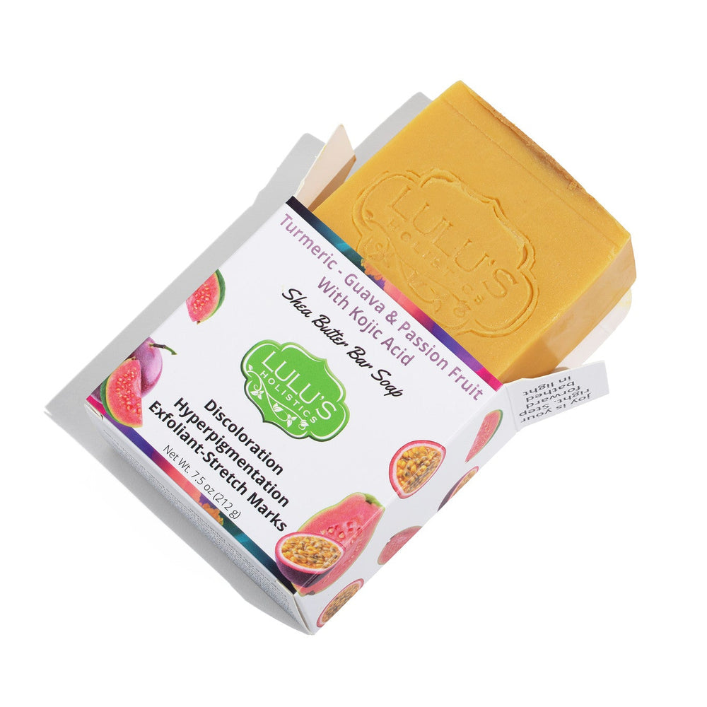 A fresh bar of Lulu's Holistics guava passionfruit turmeric and kojic dipalmitate soap, formulated with a rich shea butter base to gently cleanse and visibly fade dark spots.