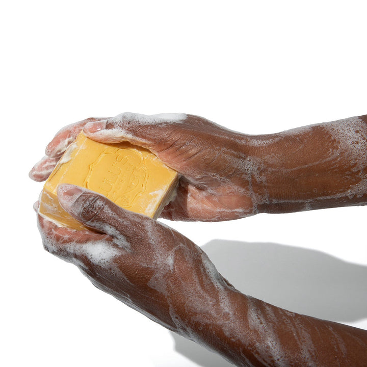 A beautifully crafted bar of Lulu's Holistics Guava Passionfruit Turmeric and Kojic Dipalmitate soap. The perfect natural daily cleanser to fade dark spots and nourish skin with raw shea butter