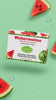 Floating box of Lulu's Holistics Watermelon with Beetroot Powder Glycerin Bar Soap surrounded by watermelon slices on a light green background
